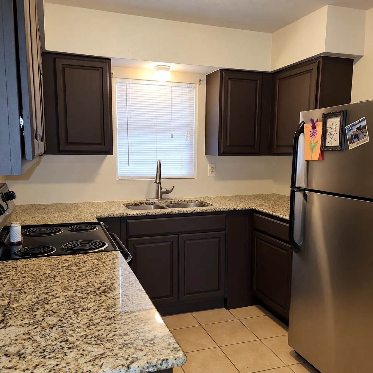 Kitchen cabinets after dark brown refinishing